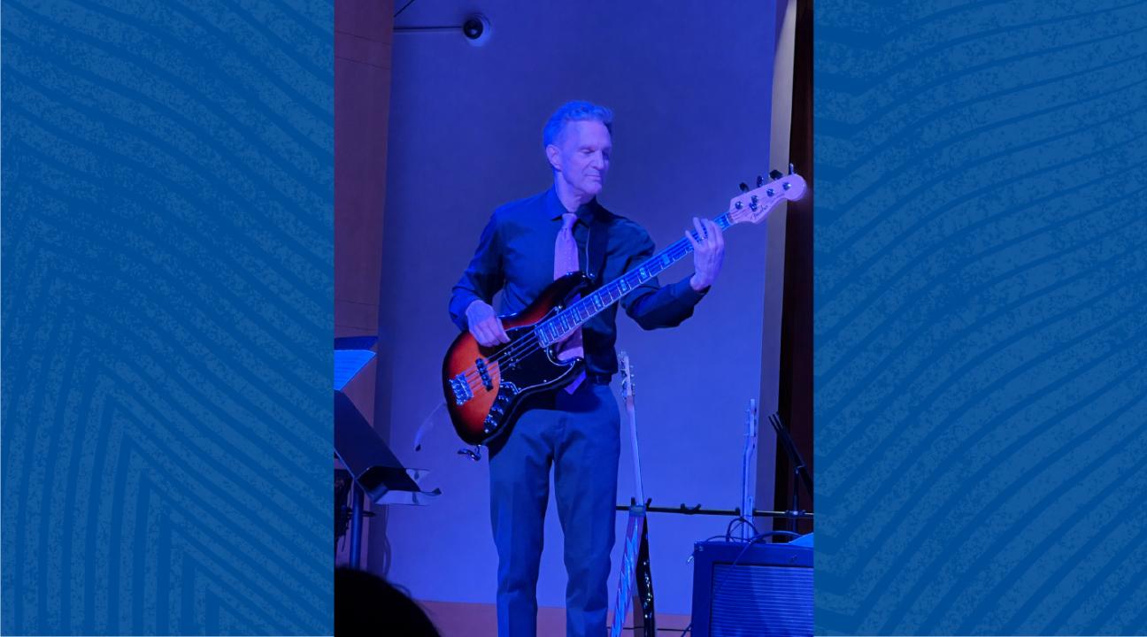 Sonoma State Professor John Palmer plays an electric bass guitar during the May 2 Rock Collegium performance at the Green Music Center.