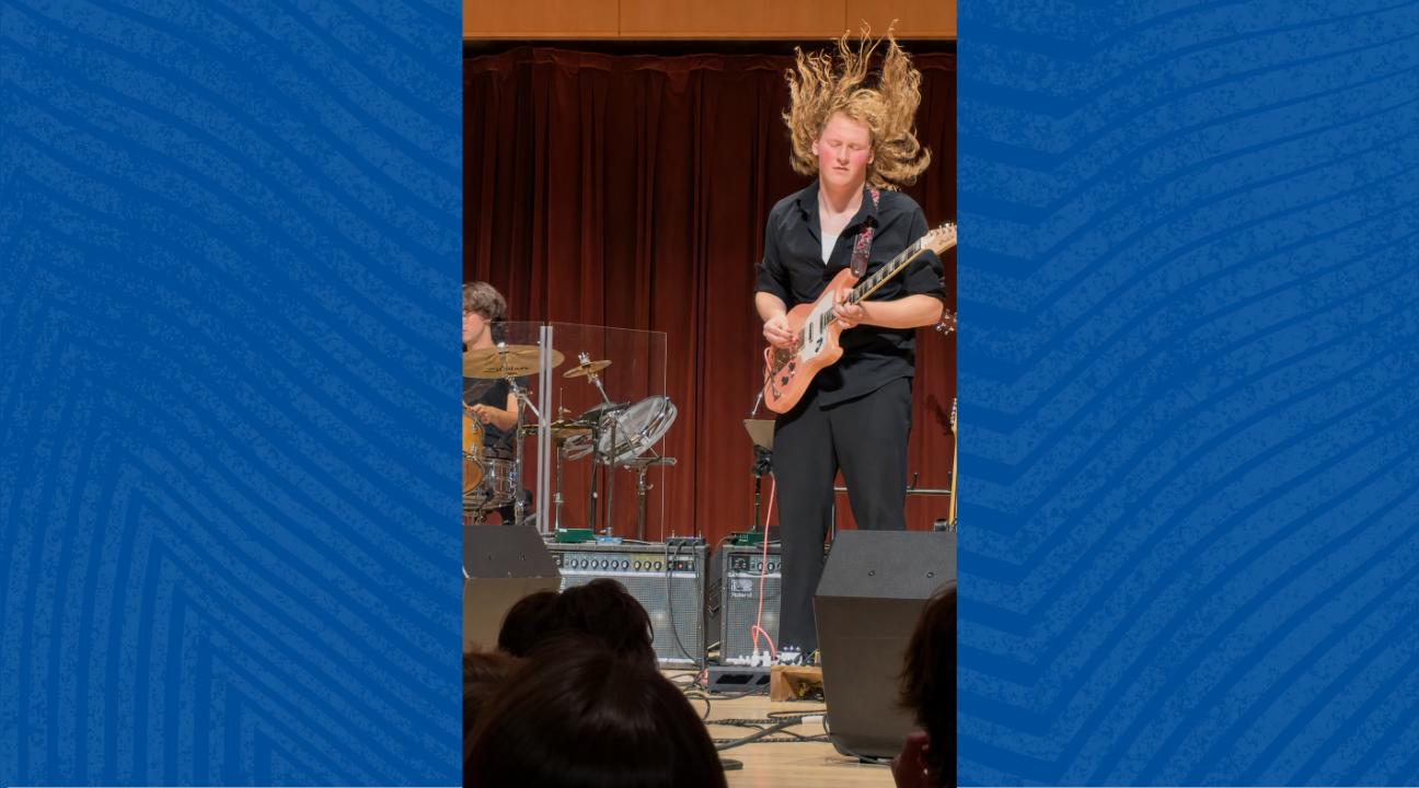 Sonoma State student Charlotte Summins plays electric guitar during May 2 Rock Collegium concert.