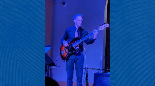 Sonoma State Professor John Palmer plays an electric bass guitar during the May 2 Rock Collegium performance at the Green Music Center.