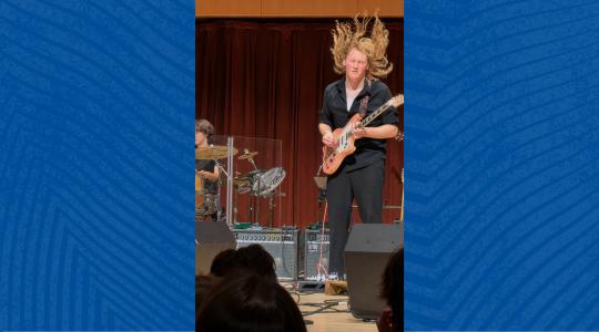 Sonoma State student Charlotte Summins plays electric guitar during May 2 Rock Collegium concert.