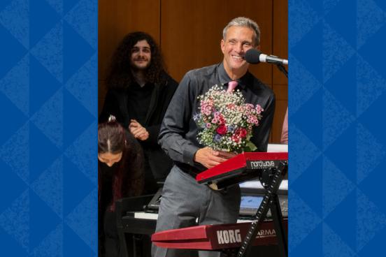 Retiring Sonoma State Professor John Palmer receives a standing ovation and a bouquet of flowers at the conclusion of the May 2 Rock Collegium performance at the Green Music Center.