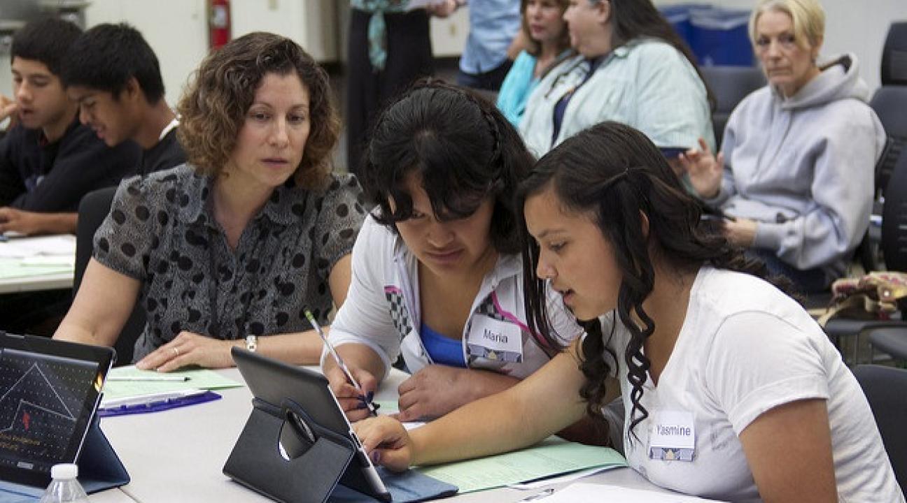 SSU Education Professor Kelly Estrada, left, in the classroom with K-12 students