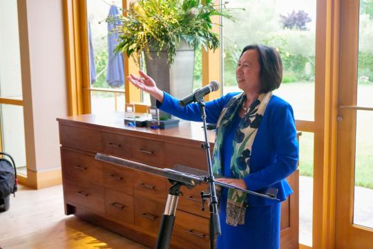 President Judy K. Sakaki presents honorary alumni