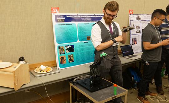 Student shows his project at Sonoma State Science Symposium 