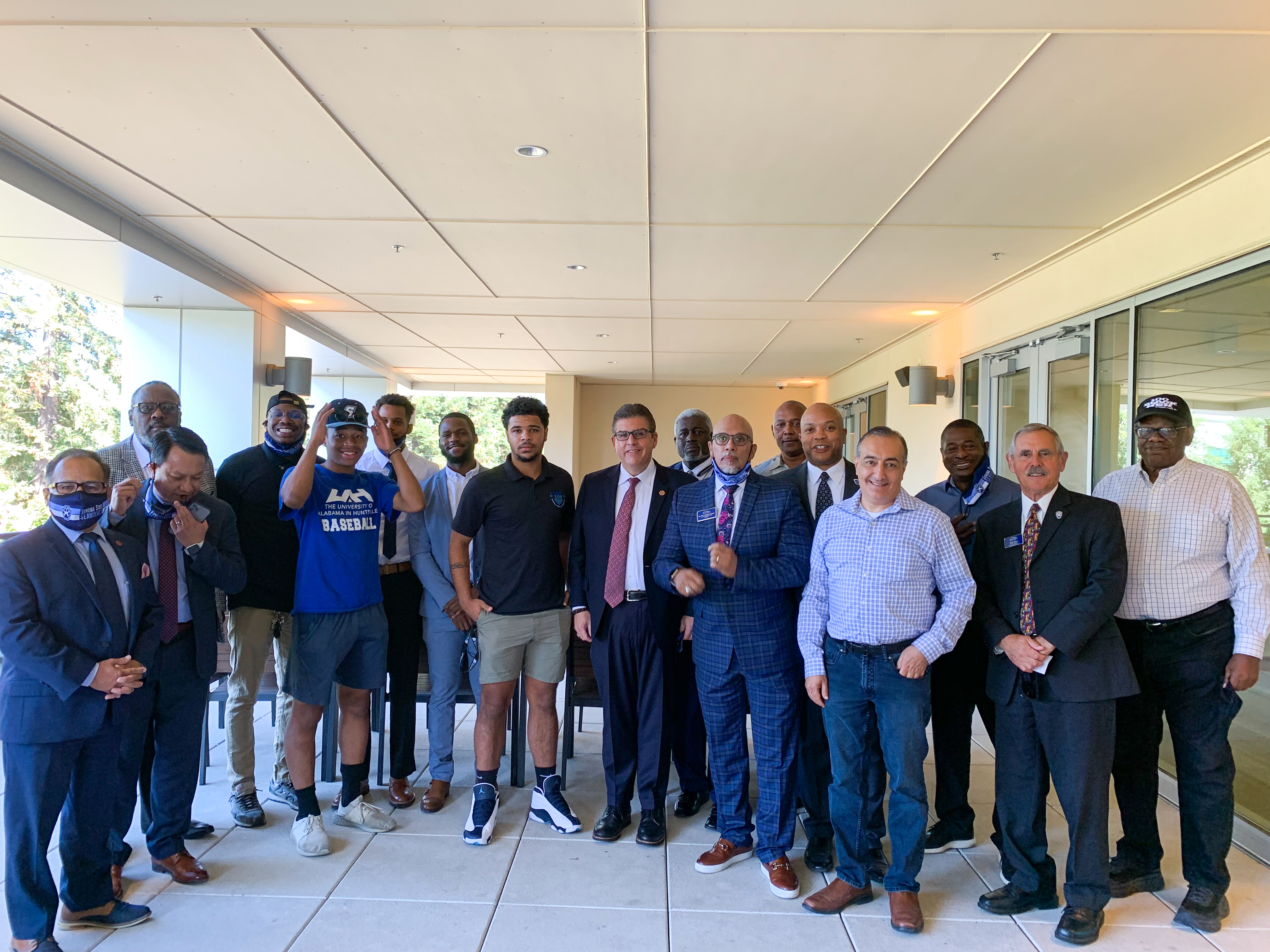 CSU Chancellor poses for a group photo with members of SSU community