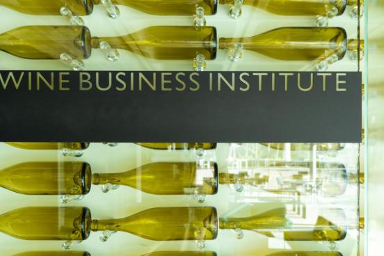 Sonoma State University Wine Business Institute illustration featuring wine bottle wall