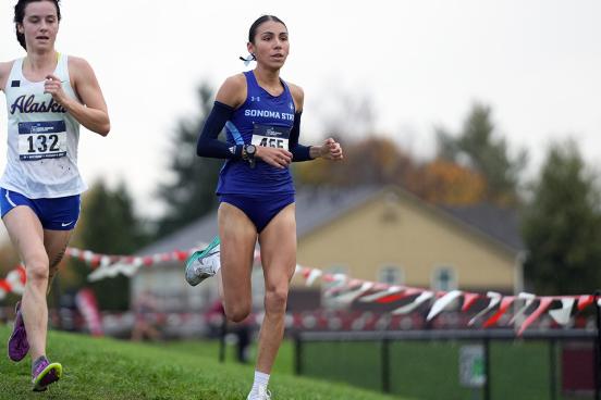 Gianna Bomarito running in cross country event