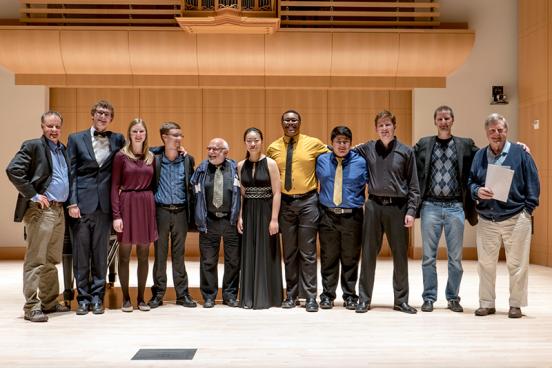 Concerto competitors and judges in Schroeder Hall concerto competitors and judges in schroeder Hall