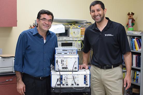 SSU engineering science professor Farid Farahmand, left, and National Instruments VP of R&D Jin Bains, right, with recently donated equipment. // Photo by Nicolas Grizzle SSU engineering science professor Farid Farahmand and National Instruments VP of R&D Jin Bains with recently donated equipment.