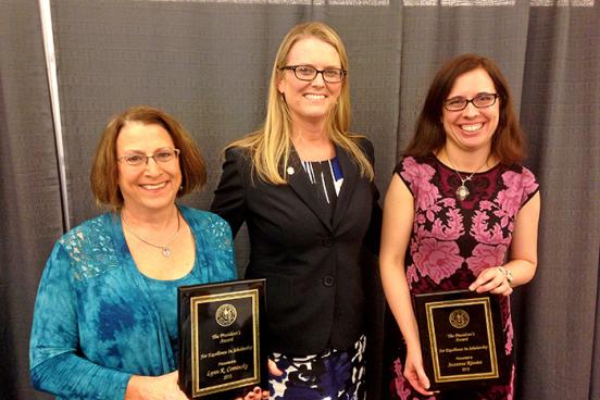  School of Science and Technology dean Lynn Stauffer congratulates Lynn Cominsky and Suzanne Rivoire on receiving the Sonoma State Excellence in Scholarship Award.