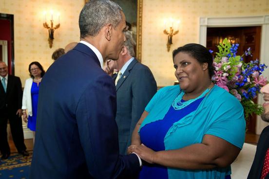 Faith Cheltenham shaking hands with President Obama