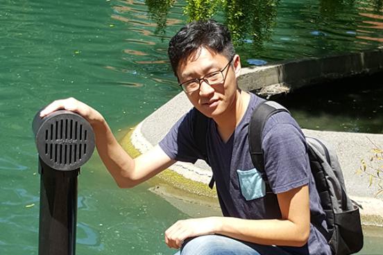 Feng Wang with his flood warning system