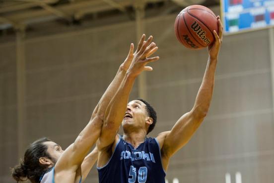 Nathan Molony-Benjamin goes up for a shot against Hawaii-Pacific University