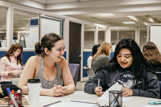 LARC tutor Arisa Leahy working with a student.