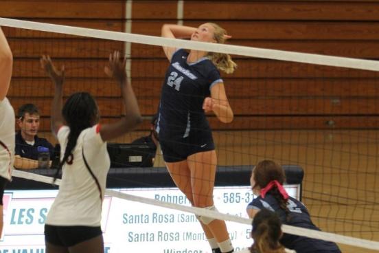 lexi reddick hitting a volleyball