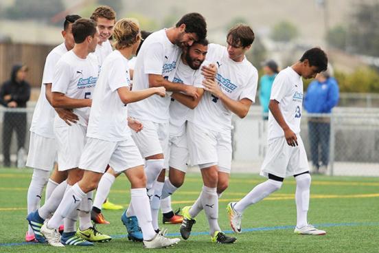 men's soccer team celebrates victory
