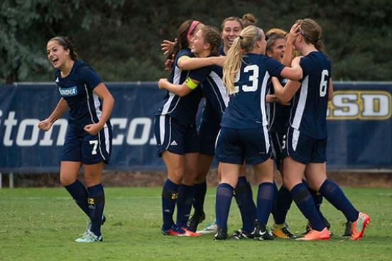 womens soccer celebrating at the ncaa tournament