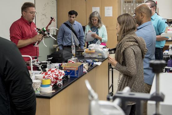 teachers exploring drones in a classroom