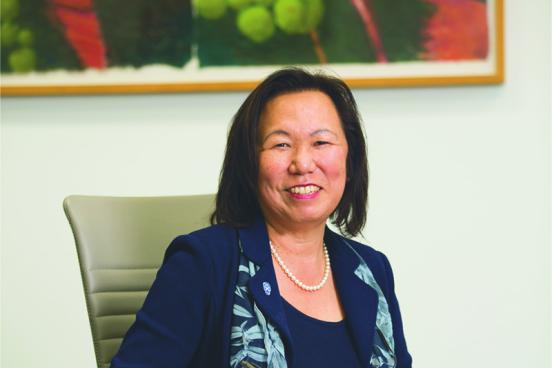 judy sakaki at her desk