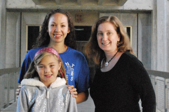  Professor Sheila Katz and SSU student Kristel England, a welfare mother who attends SSU, and her daughter. 