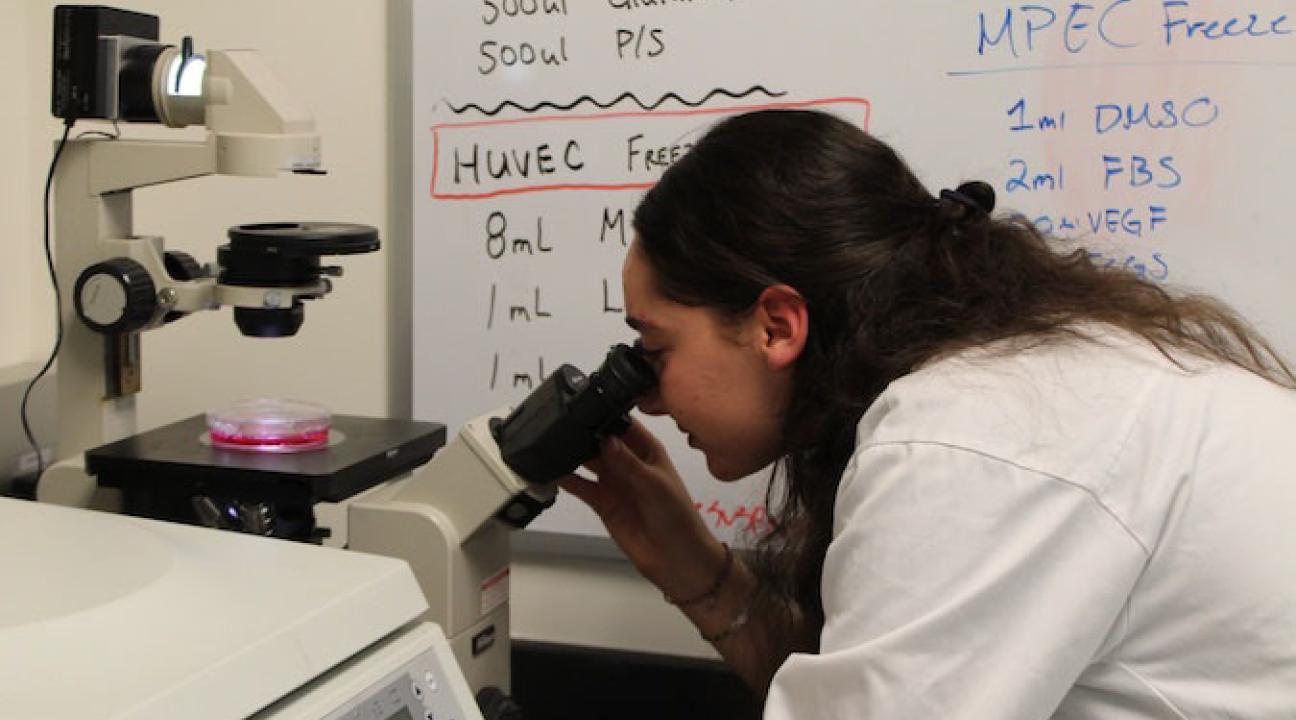 Student with microscope