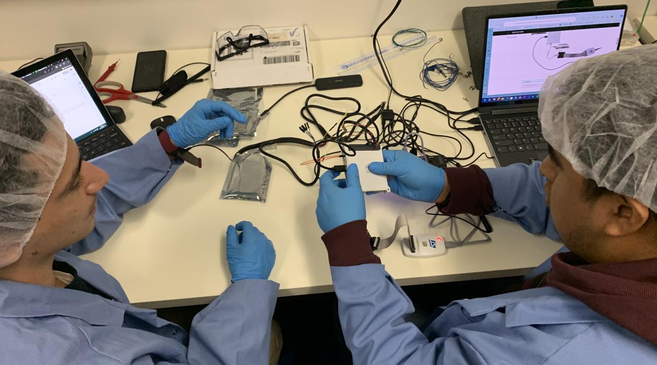 Students building CubeSat