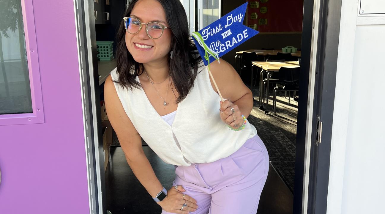 Alyson Azevedo, SSU '22, welcomes her students to the classroom on the first day of fourth grade.