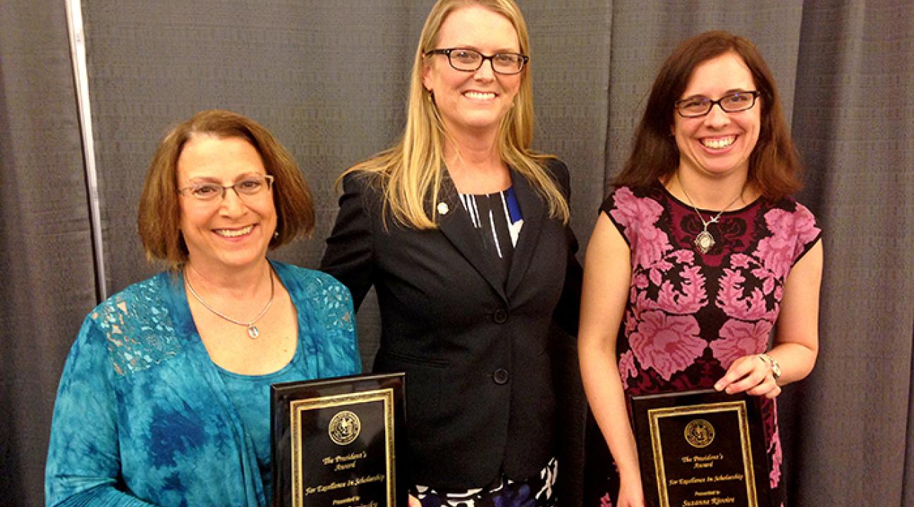  School of Science and Technology dean Lynn Stauffer congratulates Lynn Cominsky and Suzanne Rivoire on receiving the Sonoma State Excellence in Scholarship Award.