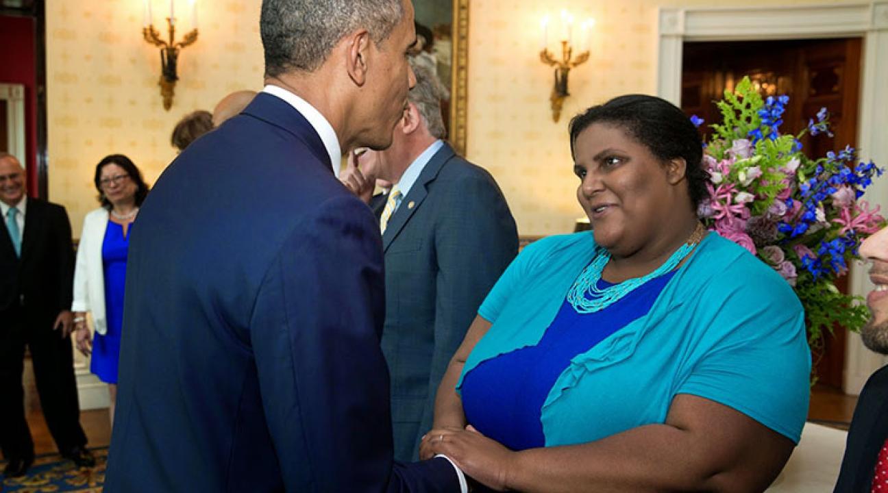 Faith Cheltenham shaking hands with President Obama