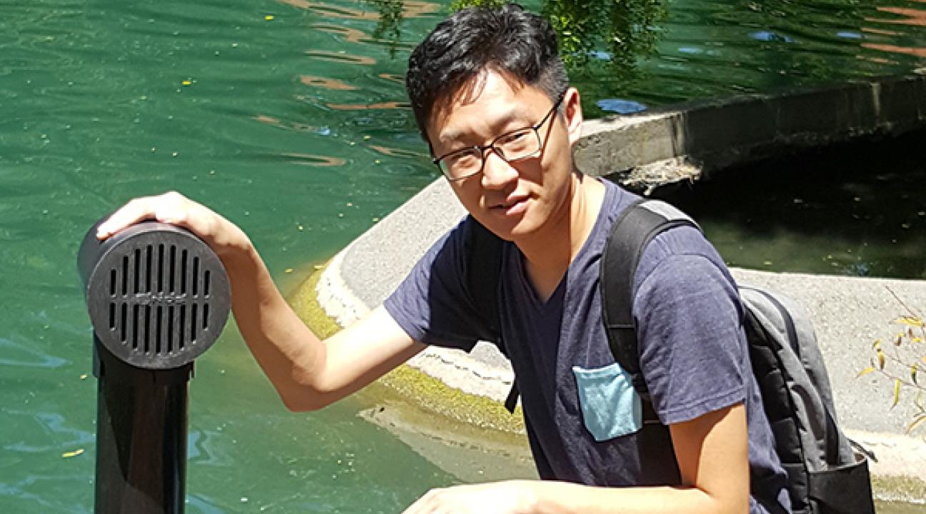 Feng Wang with his flood warning system