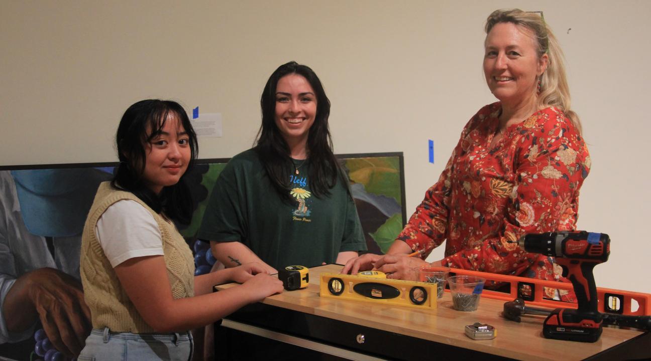 From left: Sonoma State art students Raiven Reyna and Mayla Romano with Gallery Exhibitions Manager Carla Stone. 