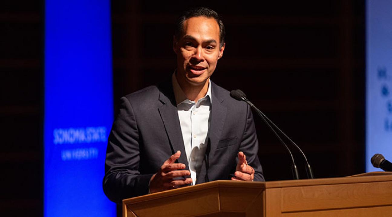Julian Castro at podium