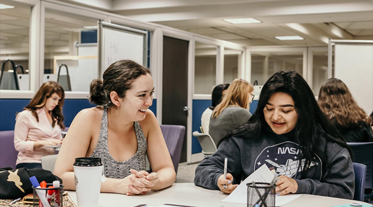 LARC tutor Arisa Leahy working with a student.
