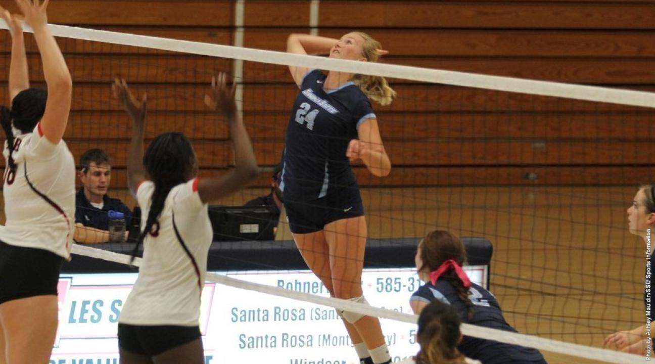 lexi reddick hitting a volleyball