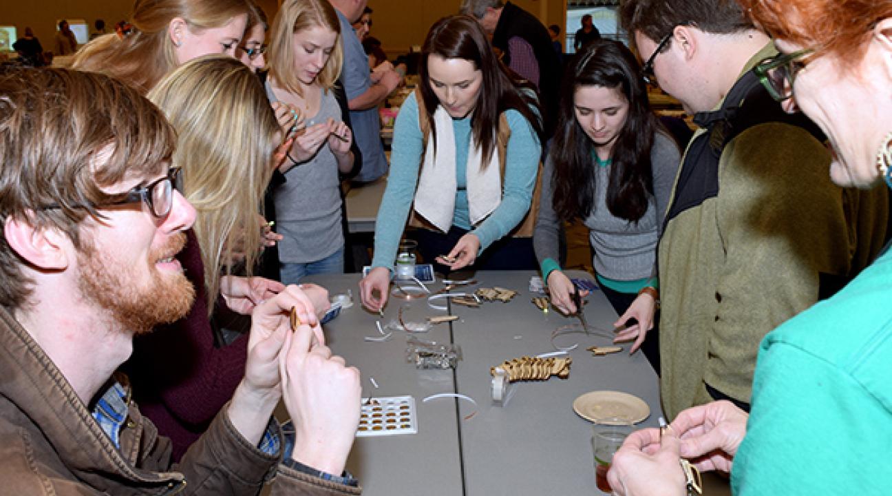 makers surrounding a table