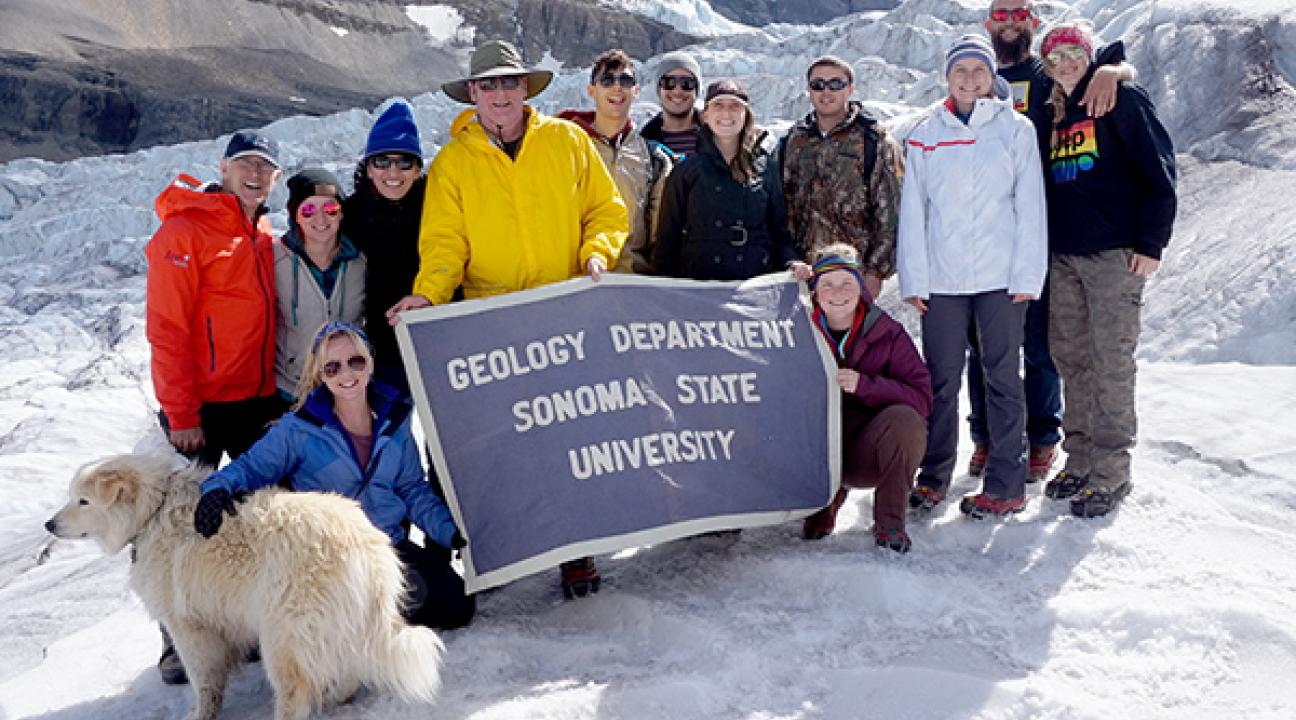 geology professor and students on glacier