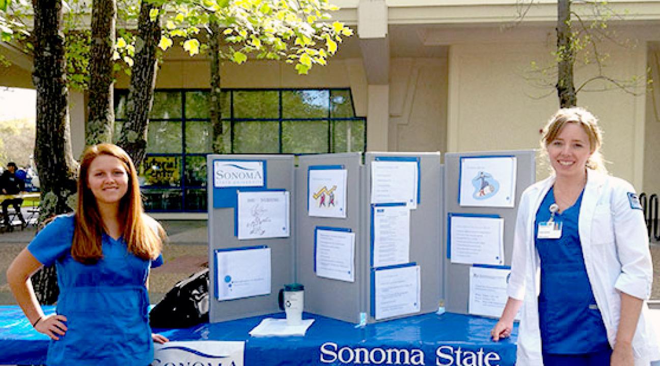 two nursing students tabling 