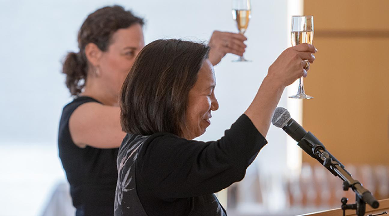 Sonoma State University President Judy K. Sakaki and OLLI Director Carin Jacobs toast the OLLI program at a champagne reception Friday afternoon after President Sakaki announced it has received a $2 million bequest. 