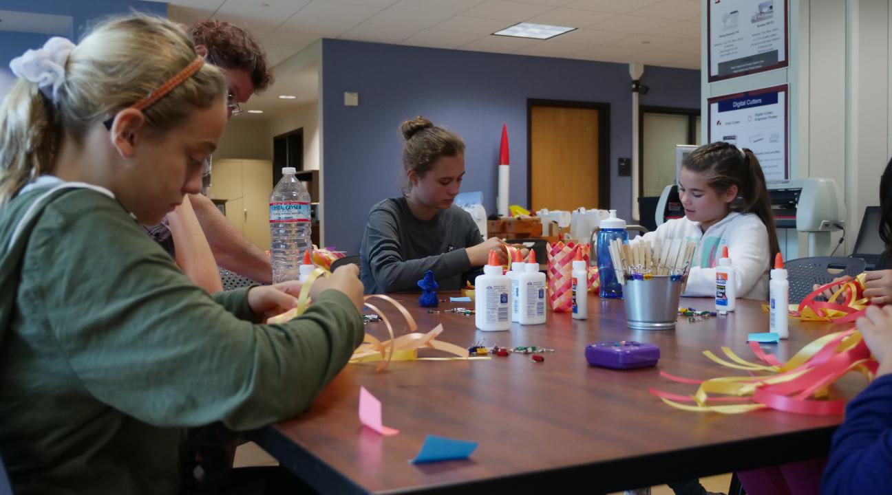 Campers focusing on their projects in the Sonoma State Makerspace // Photo by Francisco Carbajal