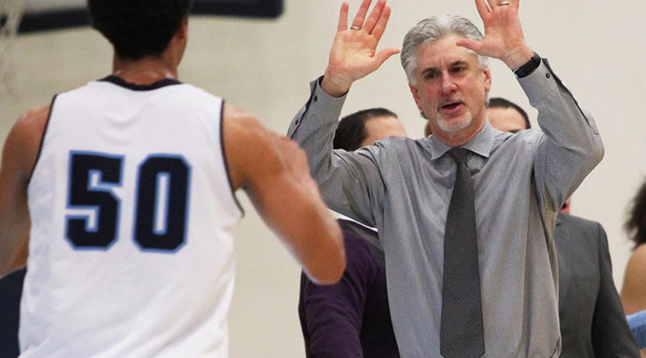 coach high fives player