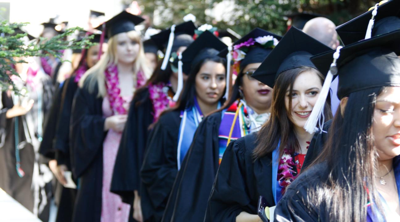 Students walking in commencement at Sonoma State 