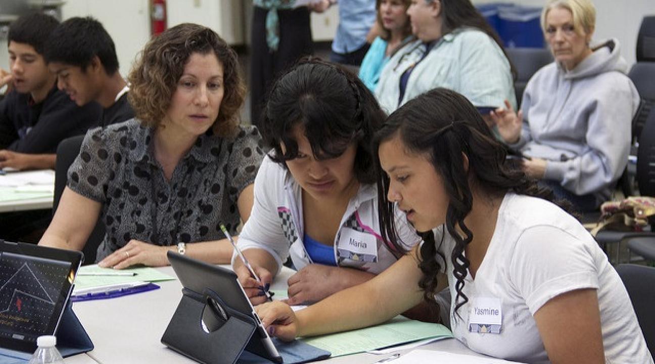 SSU Education Professor Kelly Estrada, left, in the classroom with K-12 students