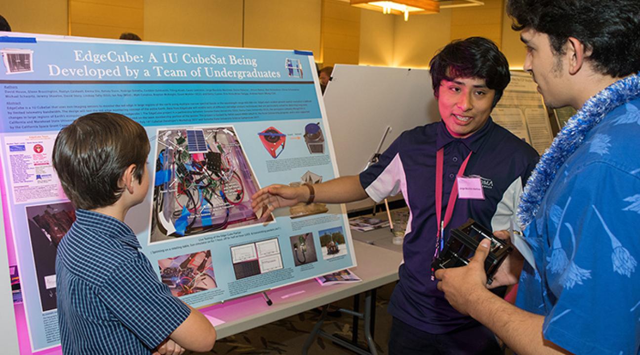 student showing his research