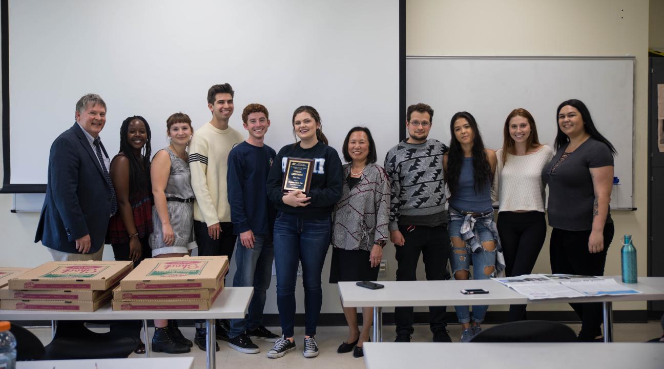President Judy K. Sakaki with The Sonoma State STAR editors and their new award. // Photo by The Sonoma State STAR