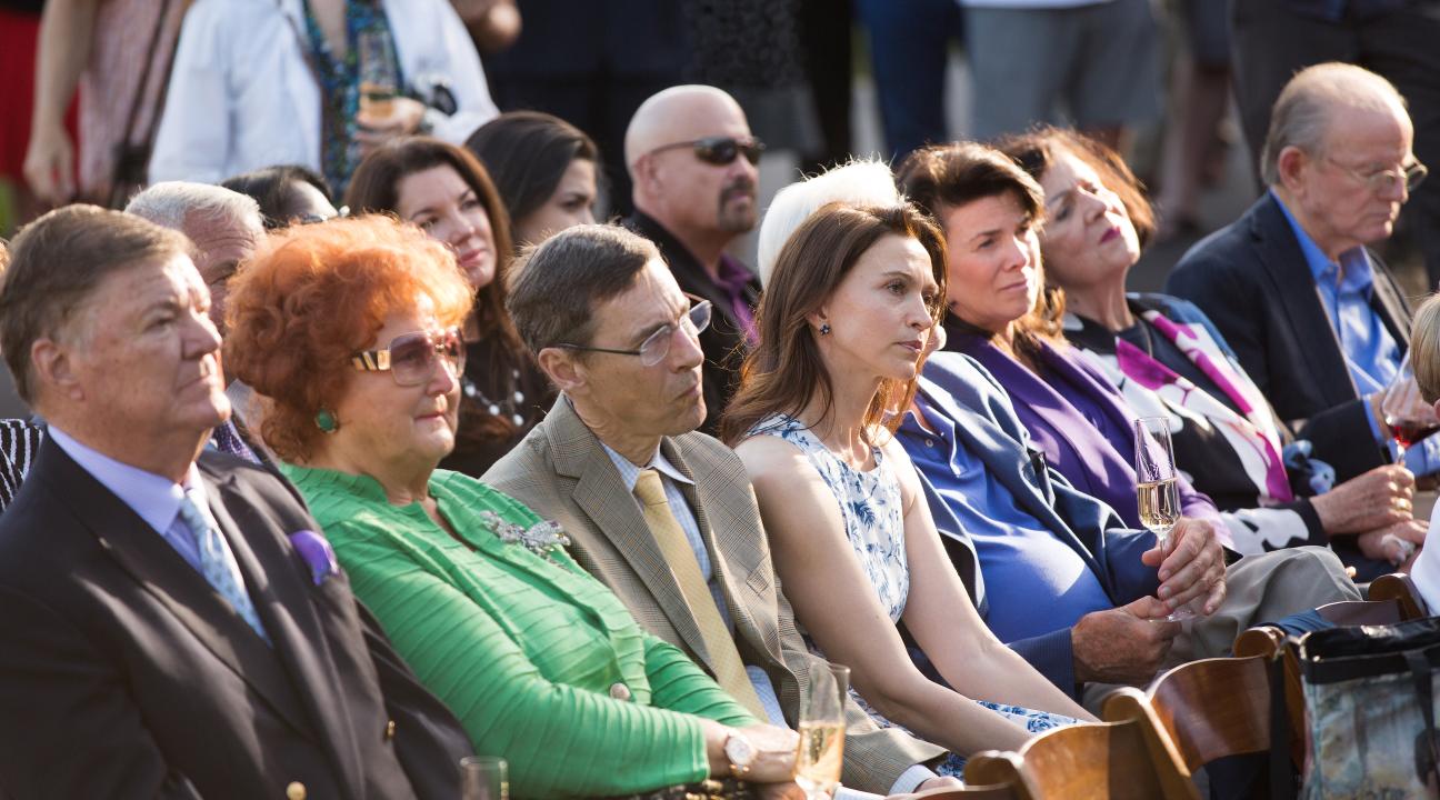 From left, Gerret Copeland and Tatiana Copeland, proprietor and president of Bouchaine Vineyards in Napa, and other audience members look on during the opening ceremonies at the Wine Spectator Learning Center at Sonoma State University on May 29.