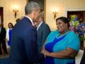 Faith Cheltenham shaking hands with President Obama