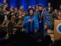 judy sakaki in ceremony with chancellor timothy white