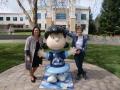 President Judy K. Sakaki and Jeanie Schulz with SSU's new Lucy statue