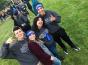 Carly Solberg poses with students for slefie