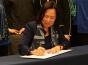President Judy K. Sakaki signs President's Climate Commitment 